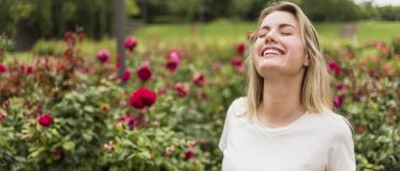 blonde woman in a white t-shirt in a good mood